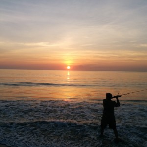 Early morning surf fishing