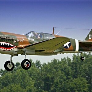 p_40_warhawk_in_flight_8d60abd3df247196e9257265297d31fa0c28097d.jpg