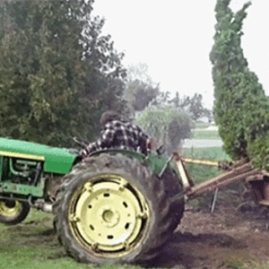 reverse-1369674187_tree_beats_tractor_driver.gif