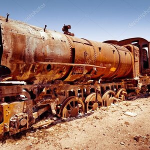 depositphotos_67396755-stock-photo-rusty-old-steam-train-in.jpg