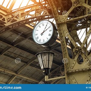 vintage-clock-lantern-train-station-building-roof-132288692.jpg