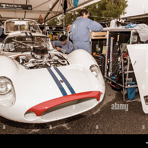 1962-maserati-tipo-151-4-litre-engine-being-prepared-in-the-paddock-DFXGP9.jpg